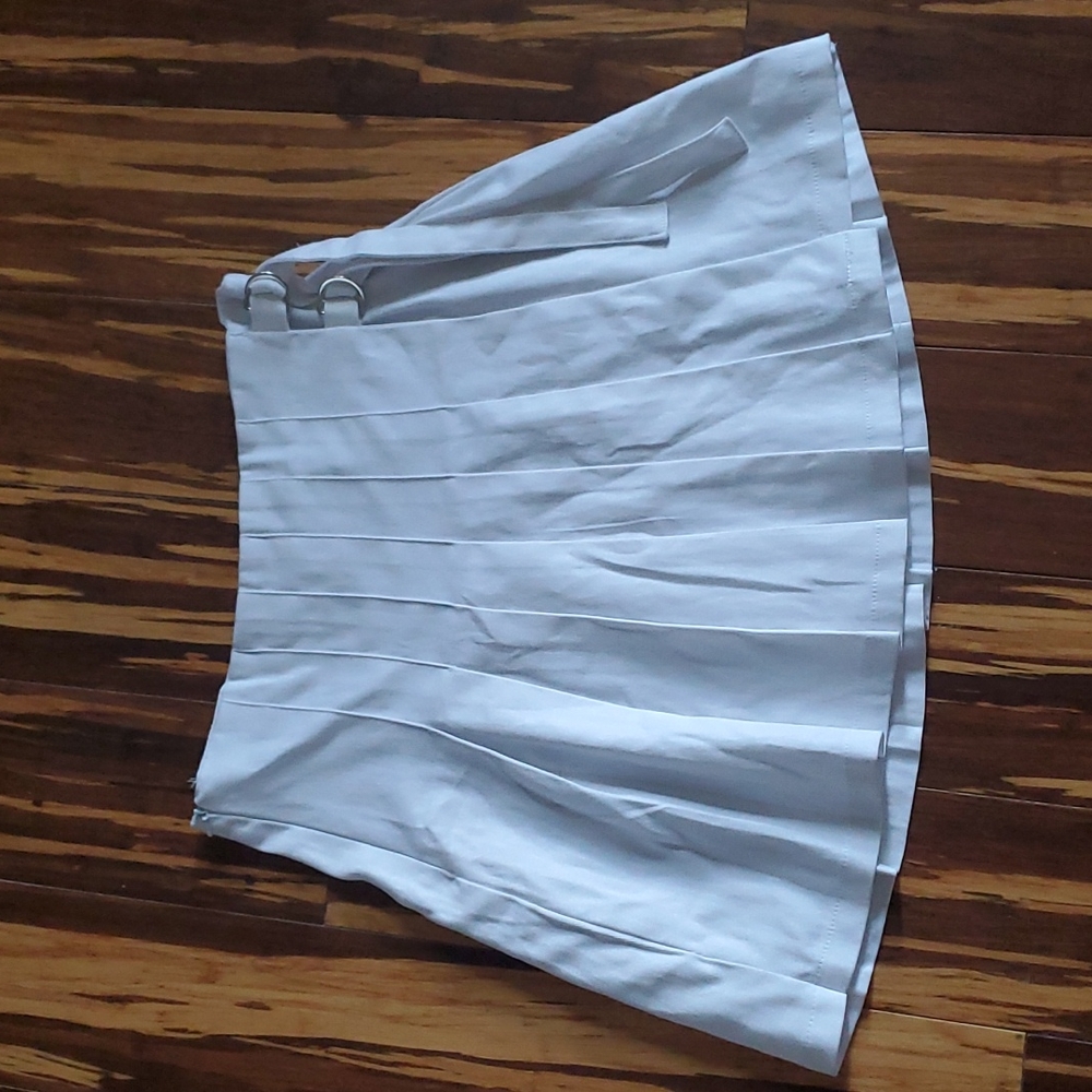 White pleated skirt